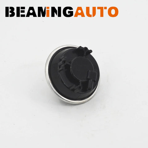 4-wheel drive differential vacuum actuator, black plastic body with a silver outer ring
