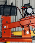 Heavy Duty Fork Mounted Jib Crane With Electric Winch features a battery and wiring on the telescopic boom, designed for warehouse use.