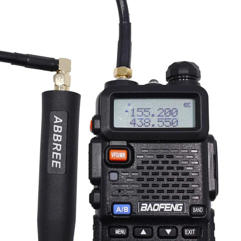 23.6 Inch Coaxial Antenna Extension Cable with SMA connectors attached to Baofeng UV-5R radio for enhanced transmissions.