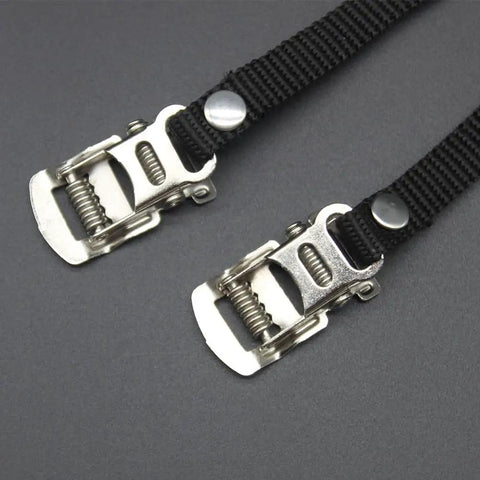 Universal Bicycle Pedal Straps One Pair Replacement Foot Straps For Bikes Or Exercise Bike Spin Class Sixteen Inch Length Durable Nylon Wear Resistant showing adjustable steel buckles.