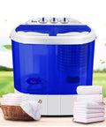 Twin Tub Semi Automatic Washer Engineered For A No Sweat Laundry Day With A Sleek Quiet Motor And Extended Hoses For Straight Up Hassle Free Cleans On Medium Loads In Small Spaces with blue and white design, situated near towels and a basket.