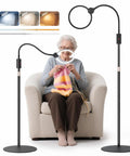 Elderly woman knitting using 10X Floor Magnifying Glass With Light And Stand, 5.1 Inch Real Glass Lens, Adjustable Height, 360 Degree Gooseneck, Three Color Modes, Hands Free Magnifier For Readin Tiny Print, Craftin And Close Work.