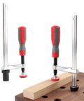 Rock Solid 2 Pack Adjustable Bench Dog Clamps For Three Quarters Inch Dog Holes On MFT Tables Holds Tight For Routing Drilling And Sanding Stable Holdfast Style Woodworking Tools on wood surface