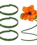 Green Flexible PVC Tubing Three Pack With Aluminum Wire Core Pro Grade Bendable Stems 78.7 Inch next to orange artificial flower