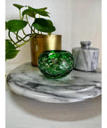 11.75 Inch Marble Lazy Susan Turntable With Vintage Gray Stone Finish featuring decor items like green vase and plant pot