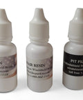 Pro Grade Windshield Repair Kit Essentials bottles with resin and pit filler for rock chip and crack fix DIY drill use.