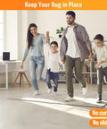 Family playing on rug secured with 8 Pack Non Slip Rug Tape For Area Rugs Reusable Double Sided Adhesive Stickers That Keep Rug Corners Flat