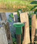 Premium Garden Cane Caps For Bamboo Sticks That Totally Block Sharp Ends And Keep Hands Safe Plus Eyes Protected From Accidents When Working In The Yard, green PVC cap on bamboo stick