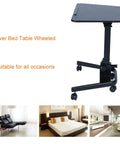 Height Adjustable Rolling Laptop Stand With Locking Casters Sleek Tilt Bed Desk For Sofa Hassle Free Mobility solid wood top in black with wheels.