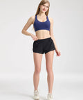 Woman wearing Women's Running Shorts With Zip Pocket And Built In Liner, Quick-Dry Lightweight Two Point Five Inch Inseam, Low Rise Gym Yoga Athletic Shorts For Running Training And HIIT, Breathable Sweat-Wicking Black.