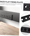 Heavy Duty Flat Bracket Track Rail Connector For Barn Doors And Home DIY Projects, Durable Carbon Steel Mending Plate And Track Stopper, Solid 4 Hole Brace Mount, Metal Repair Plate For Long Lasting Door Track Support installed on wall with wooden floor scene.