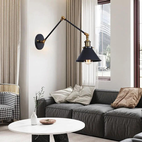 Badass Industrial Swing Arm Wall Sconce Adjustable Metal Light Fixture E27 Socket illuminating a cozy living space with stylish decor.