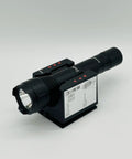 Emergency LED Wall Mount Flashlight TM603 1000 Lumen High Power Tactical Light on charging stand, angled view