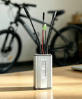 Top Tier 36V Or 48V Ebike Controller Upgrade For Brushless Motors With Smooth Sine Wave Tech, 500W Power And 22A Peak Current For Serious Riders. silver aluminum e-bike controller with wires