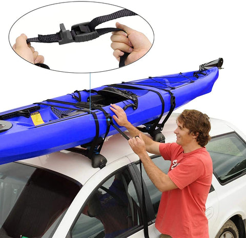 Man securing kayak on car roof rack with Beefy 16 Foot Tie Down Straps With Rubber Padded Cam Lock Buckle, 1 Inch Wide, 600 Lb Working Load.