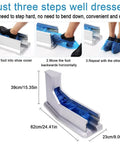 Top Tier Automatic Shoe Cover Dispenser With Disposable Plastic Booties For Cleanrooms And Home Offices No Cord Drama Pull Operated Stand in use for easy shoe cover application.