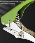 Close-up of a heavy duty single hole punch with green handle, ergonomic zinc alloy design, for 8mm holes in cards and crafts.