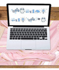 Large Extended Keyboard And Mouse Pad Set With Memory Foam Wrist Rests For Ergonomic Typing Ultra Smooth Desk Pad 3 Piece Pink Gold For Home Office Study And Gaming viewed from top with laptop placed on pink gold desk pad