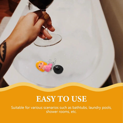Mermaid Bathtub Stopper Rubber Plug with Chain for Easy Drain in a bathtub, showing playful design with pink mermaid and black rubber.