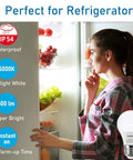Woman opening fridge with LED Refrigerator Light Bulb 60W Equivalent A15, 600 Lumen, 7W, daylight 5000K features displayed