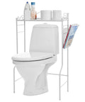 White metal over-the-toilet storage shelf with magazine basket and toiletries, freestanding organizer rack in bathroom