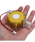 Water Flow Generator Kit Three Pack 12V Regulated Micro Type Hydro Generator in hand, compact size, rust resistant.