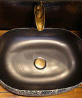 USZWBY Vessel Sinks Bathroom Vessel Sink Creative Ceramic Washbasin Retro Art with sleek black finish and gold faucet.