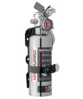 Heavy Duty Compact Fire Extinguisher For Cars Trucks Race Rigs Clean Halotron Formula Beats Dry Powder No Fuss Safe For Engines And Electronics Ul Listed Chrome Body One Point Four Pound mounted on bracket with safety instructions.
