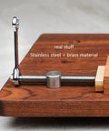 Professional Grade Woodworking Table Vise With Tenon Stop Strip Rock Steady Bench Fixture For Hardcore Carpenter And Machinist Shop Rig Built Tough Brass Workshop Clamp showing stainless steel and brass components.