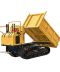 Heavy Duty Mini Crawler Dumper Workhorse With Kickass Hydraulic Dump Bed And Grippy Steel Tracks unloading gravel on site.