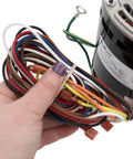 Person holding wiring for HVAC Blower Motor Replacement Three Quarters HP 1 Phase Three Speed 120 Volt 1075 RPM Model Specific