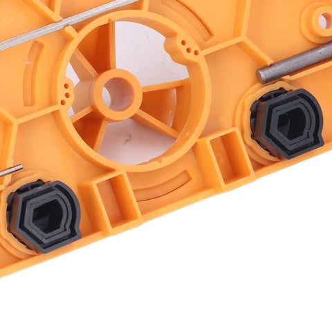 Close-up of Heavy Duty Aramox Hinge Hole Saw Jig For Woodworking Pros showing adjustable depth stop and screw spacing options.