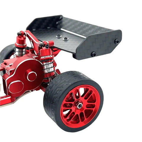 Beefed Up RC Car Upgrade Kit For One Twenty Fourth Scale Micro B with metal wheel hub tires and flexible rubber grips.