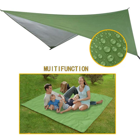 Double Parachute Nylon Camping Hammock Set With Rain Fly Tarp Mosquito Net And Tree Straps Lightweight Dope Gear For Backpacking Hiking Travel And Outdoor Yard Fun showing green rain fly tarp in use