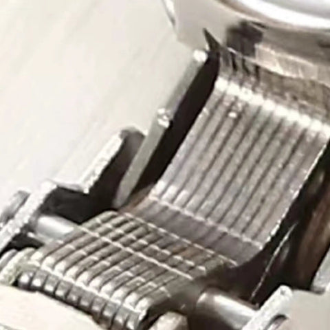 Close-up of Invisible Cabinet Hinges With Soft Close, Stainless Steel Overlay Hardware showing intricate stainless steel construction.