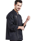 Professional Black Long Sleeve Chef Jacket With Rugged Zipper Closure And Ultra Breathable Kitchen Cook Uniform Engineered For The Daily Hustle Featuring Soft Comfy Fabric And Smart Pockets on a model.