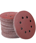 Stack of Super Tough 50 Pack Sanding Discs with Fast Hook Loop Change for Woodworking Metal Polishing, featuring aluminum oxide material.