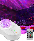3 In 1 Starry Night Projector With Ocean Wave Nebula Effects Bluetooth Music Speaker With Remote Color Changing LED Modes For A Dope Bedroom Vibe And Room Decor illuminating room with purple lights and remote control visible