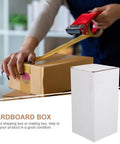 Packing a box used with 10 Pack White Corrugated Cardboard Shipping Boxes With High Durability And Stable Weight Support For Small Business Packaging And Mailing Supplies Stackable Lightweight Cardboard Boxes For Easy Storage.