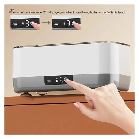 Portable Ultrasonic Cleaner With Rechargeable Battery For Jewelry And Watches showing control panel with display settings and hand operation.