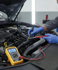 Shop Ready 3 In 1 Motor Checker And Insulation Megohmmeter in use by a technician testing vehicle wiring.