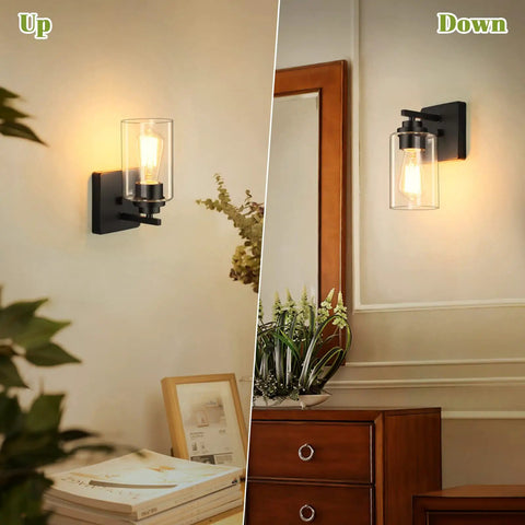Modern Wall Sconces Set Of Two For Bathroom Vanity Killer Matte Black Finish With Clear Glass Shades in up and down positions.
