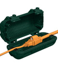 Outdoor Extension Cord Cover Waterproof With Four Removable Latches Heavy Duty Weatherproof Electrical Box Plug Cover For Patio Power Tools Holiday Lights IP54 Sealed Green, shown open with orange cord inside.