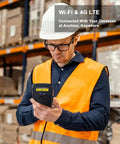 Worker using Rugged 5.5 Inch Touchscreen Handheld Barcode Scanner PDA in warehouse, wearing helmet and safety vest.