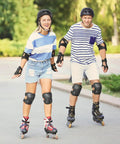 Two people rollerblading wearing Adult And Youth Skating Protective Gear Set With Helmet Knee Pads Elbow Pads And Wrist Guards