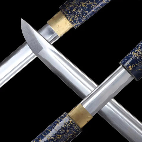 Close-up of Full Tang High Carbon Steel Iaido Samurai Sword with blue lacquer scabbard details showing blade and handle.