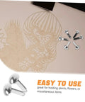 100 Piece Iron Brads With Double Leg Pins For Puppet Craft, Scrapbooking, Doll Making, shown with decorative background