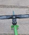 31.8mm Drop Handlebar 420mm Aluminum Alloy 7075 Road And BMX Bike Bar mounted on green bicycle, top view