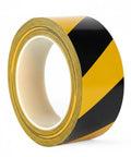 Top Shelf Yellow Floor Marker Tape With Hell Yeah Adhesion For Concrete And Epoxy Surfaces, 2-inch wide roll with black stripes.