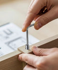 Person using All In One 362-Piece Set Screw Kit With Metric M3 To M8 And SAE 1/8 To 5/16 Inch Sizes for furniture repair